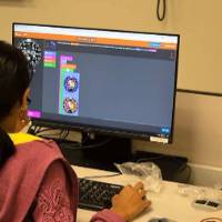 A student participates in a project with an online component